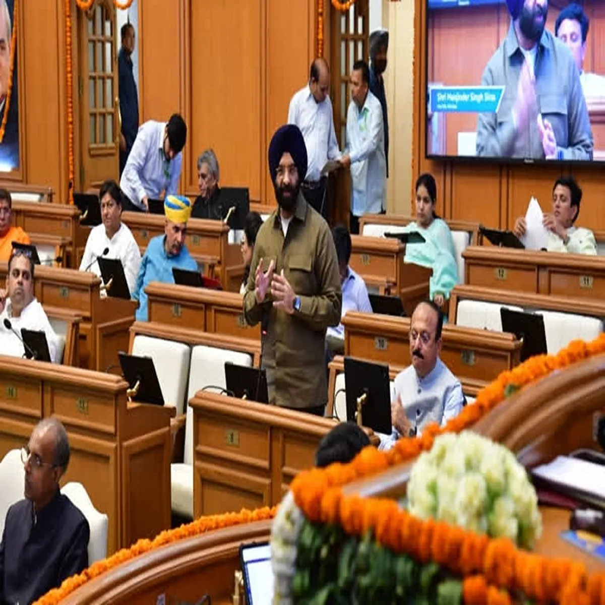 Politics delhi assembly passes motion targeting