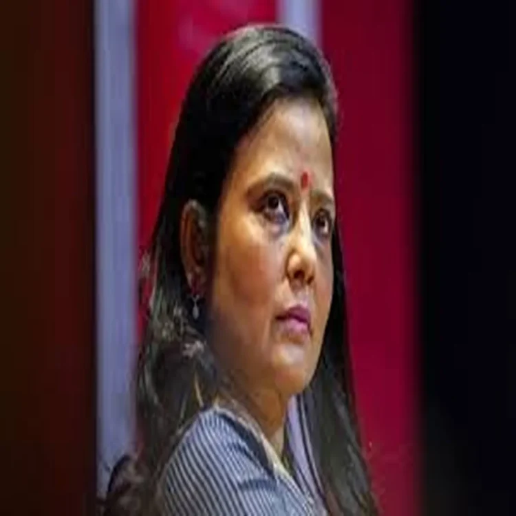 Mahua moitra backs singhvi on tmc merger row